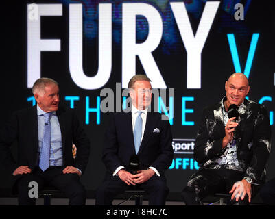 (From left to right) BT Sport commentator John Rawling, promoter Frank Warren and Tyson Fury during the press conference at BT Sport Studio, London. Stock Photo