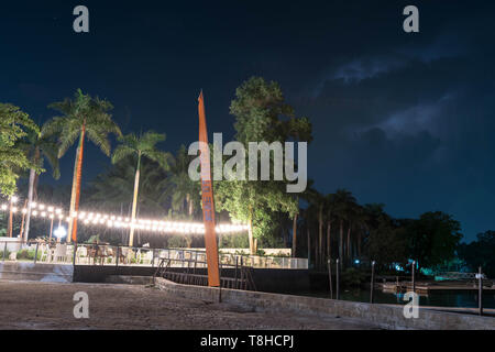 Resorts view near a beach during night with lights and nature and sand with clear night sky and stars somewhere in Asia Stock Photo