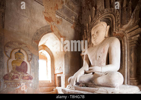 Buddha statue and paintings in a temple near Alotawpyae temple, Old Bagan and Nyaung U village area, Mandalay region, Myanmar, Asia Stock Photo