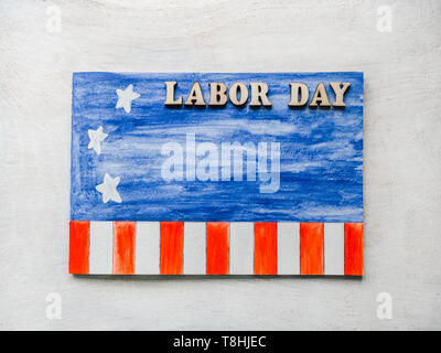 Beautiful card with congratulations on Labor Day Stock Photo