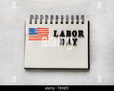Beautiful card with congratulations on Labor Day Stock Photo