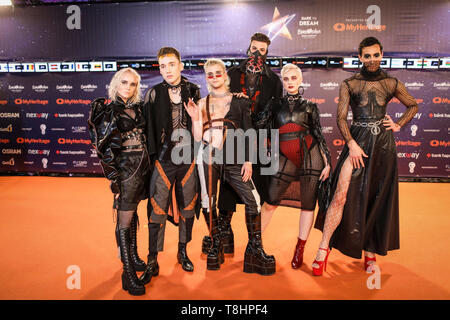 Tel Aviv, Israel. 12th May, 2019. Icelandic band Hatari pose for a picture at the orange carpet during the opening ceremony of the Eurovision Song Contest 2019. Credit: Ilia Yefimovich/dpa/Alamy Live News Stock Photo
