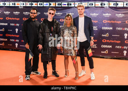 Tel Aviv, Israel. 12th May, 2019. Belgian singer Eliot and his band pose for a picture at the orange carpet during the opening ceremony of the Eurovision Song Contest 2019. Credit: Ilia Yefimovich/dpa/Alamy Live News Stock Photo