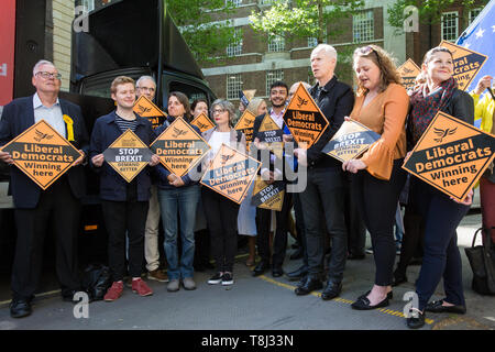 London, UK. 14 May, 2019. Liberal Democrat members prepare to launch a poster criticising Labour Party Leader Jeremy Corbyn’s cooperation with the Conservative Party in attempting to deliver Brexit to be used as part of the Liberal Democrats’ European election campaign. Credit: Mark Kerrison/Alamy Live News Stock Photo