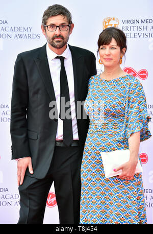 Louis Theroux and Nancy Strang attending the Virgin Media BAFTA TV awards, held at the Royal Festival Hall in London. Stock Photo