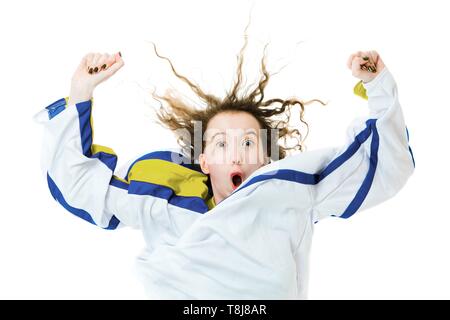 Hockey fan in jersey in national color of Sweden cheer, celebrating goal - gesture of winning the game - white background Stock Photo