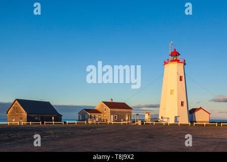 Canada, New Brunswick, Acadian Peninsula, Miscou Island, Miscou Lighthouse, sunset Stock Photo