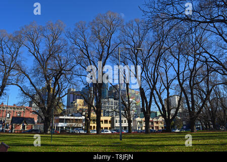 South view of Melbourne CBD from south side of Carlton Gardens, World Heritage Site that includes the Royal Exhibition Building Stock Photo