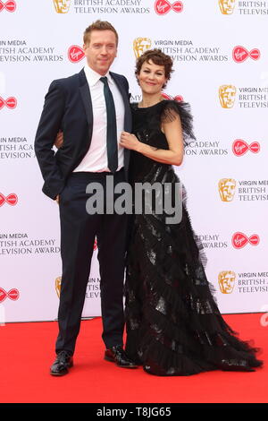 Damien Lewis and Helen McCrory are  seen on the red carpet during the Virgin Media BAFTA Television Awards 2019 at The Royal Festival Hall in London. Stock Photo