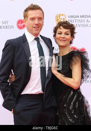 Damien Lewis and Helen McCrory are  seen on the red carpet during the Virgin Media BAFTA Television Awards 2019 at The Royal Festival Hall in London. Stock Photo