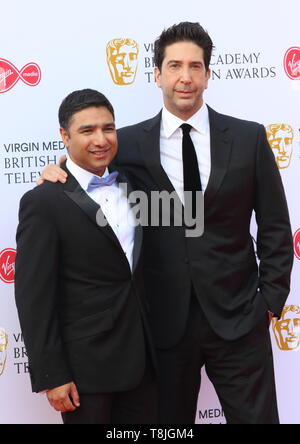 David Schwimmer and Nick Mohammed are seen on the red carpet during the Virgin Media BAFTA Television Awards 2019 at The Royal Festival Hall in London. Stock Photo