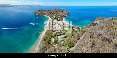 PAPAGAYO, COSTA RICA -18 MAR 2019- Aerial view of the Four Seasons Resort Costa Rica and the Peninsula Papagayo during the dry season in Guanacaste. Stock Photo