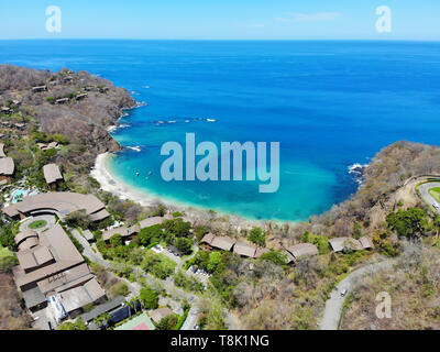 PAPAGAYO, COSTA RICA -18 MAR 2019- Aerial view of the Four Seasons Resort Costa Rica and the Peninsula Papagayo during the dry season in Guanacaste. Stock Photo