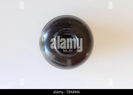 Antique switch on off bakelite, isolated on white background, close-up Stock Photo