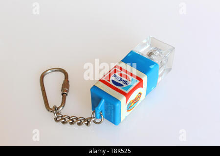 Pepsi-Cola key ring, isolated on white background, close-up Stock Photo
