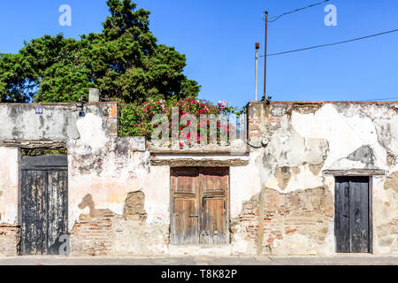 Antigua, Guatemala - April 14, 2019: Old crumbling ruined wall in colonial city & UNESCO World Heritage Site of Antigua.