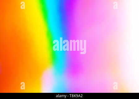 colorful holographic paper with rainbow lights. Stock Photo