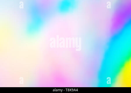 colorful holographic paper with rainbow lights. Stock Photo