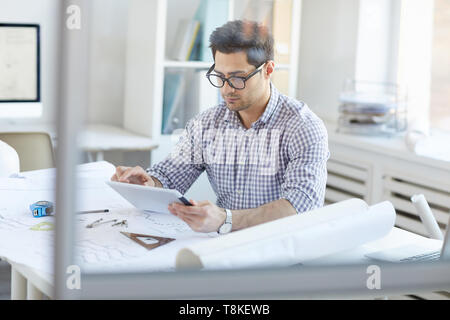 Engineer Using Digital Tablet Stock Photo