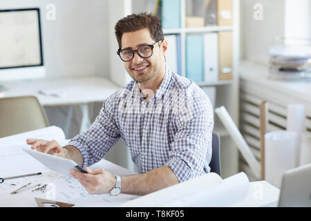 Middle-Eastern Engineer Using Digital Tablet Stock Photo
