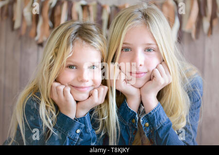 Two pretty girls possing at studio Stock Photo