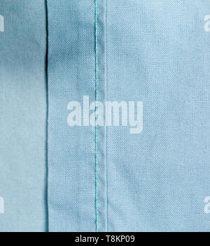 pastel light blue cloth fabric textile background. texture. Stock Photo