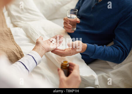 Senior Man Taking Pills Stock Photo