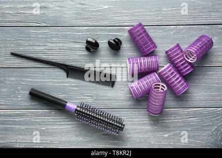 Hair supplies on wooden background Stock Photo