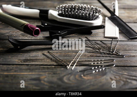 Professional hairdresser's set on wooden background Stock Photo