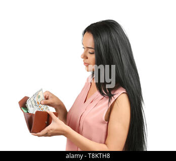 Young woman holding wallet with money on white background Stock Photo