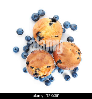Tasty blueberry muffins on white background Stock Photo
