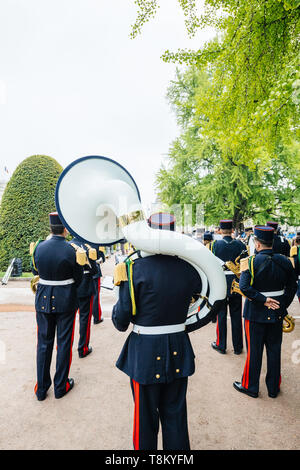 STRASBOURG, FRANCE - MAY 8, 2017: Ceremony to mark Western allies World War Two victory Armistice in Europe marking the 72nd anniversary of victory - playing big brass tuba  Stock Photo