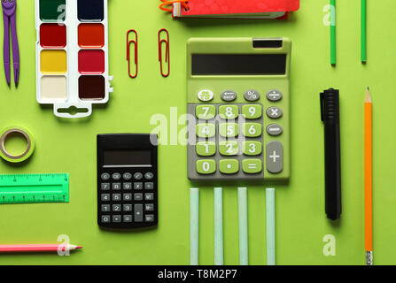 Composition with different school stationery on color background Stock Photo