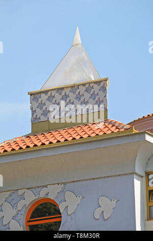 Skopje, Macedonia - September 17, 2012: Top of Memorial House and Museum Building of Mother Teresa in Skopje, Macedonia. Stock Photo