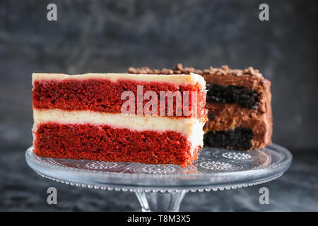 Pieces of delicious cakes on stand Stock Photo