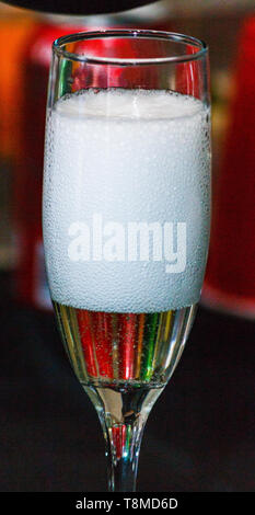 Single flute of champagne with lots of bubbles Stock Photo