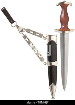 An NSKK service dagger M 36 with chain hanger Blade with etched motto. Nickel-plated cross-guard, the lower with obverse plain engraving 'In Treue Dein Bunsen' and reverse '22.12.37'. Brown wooden grip with inset nickel silver eagle and enameled SA emblem. Black painted steel scabbard with nickel-plated fittings and iron chain hanger, this stamped with 'Musterschutz NSKK-Korpsführung'. Length 35 cm. In uncleaned condition. historic, historical, organisation, organization, organizations, organisations, 20th century, Editorial-Use-Only Stock Photo