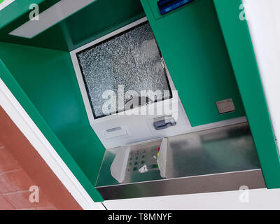 The attacker committed a robbery of an ATM Stock Photo
