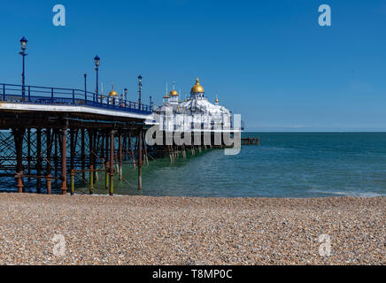 Eastbourne Pier. Completed in 1872, it is 300 meters long and built on stilts, which rest in cups on the seabed allowing the whole structure to move. Stock Photo