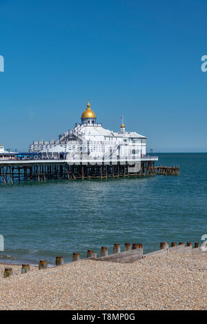 Eastbourne Pier. Completed in 1872, it is 300 meters long and built on stilts, which rest in cups on the seabed allowing the whole structure to move. Stock Photo