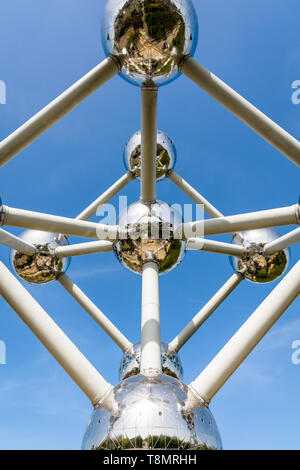 Symmetrical view from below of the Atomium in Brussels, Belgium, against blue sky. Stock Photo