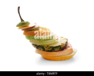 Slices of different fresh fruits on white background Stock Photo