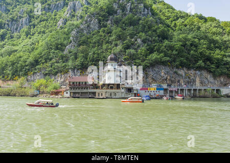 View of the orthodox Monastery Mraconia in beautiful gorge Iron Gate  (Portile din Fier) on the shore river Danube in Romania. Stock Photo