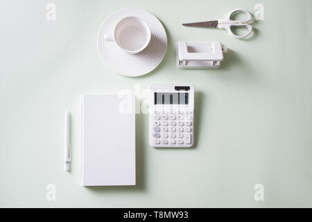Office supplies composition on white background. Flat lay, top view. Stock Photo