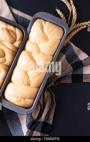 Food bakery concept making bread dought for brioche Braided Bread loaf with copy space Stock Photo