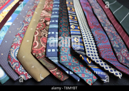 Close up of different patterned ties in a row Stock Photo