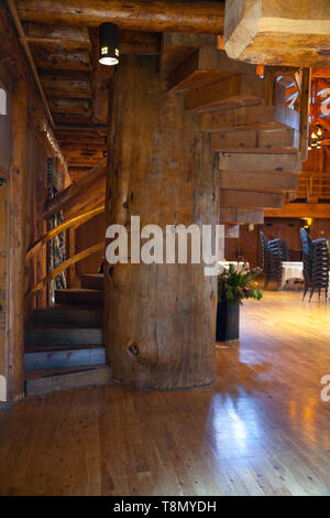 The Grand Hall displays many rustic construction features in this elegantly appointed officer’s mess building using hand hewn logs and native stones. Stock Photo