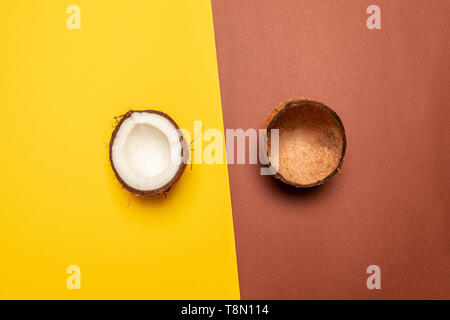 Creative Fruit background. Layout made of coconut. Flat lay, top view, copy space Stock Photo