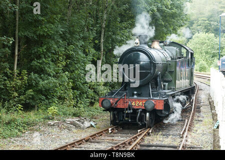 GWR class 2-8-0T 4247 train pulling in to Bodmin Parkway Railway Station Cornwall UK Stock Photo