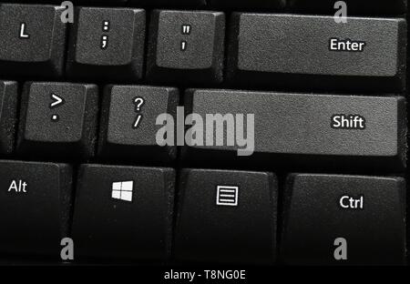 Close up of Enter, shift and control keys on black keyboard. Stock Photo